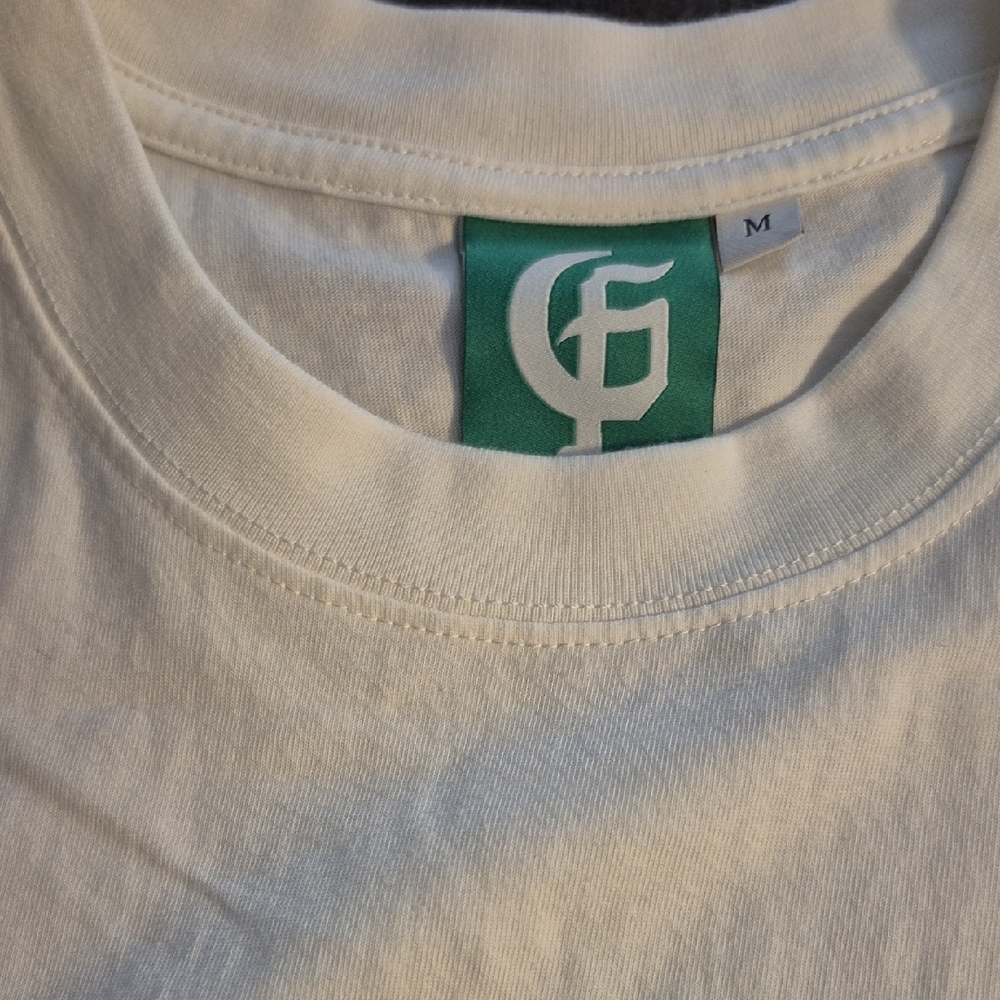 Men's White Graphic Tee with Green Design - Picture 2 of 6